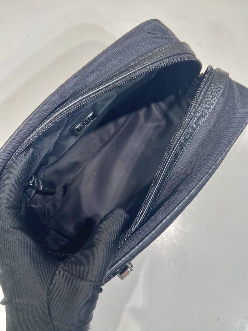 Pra*a clutch bags